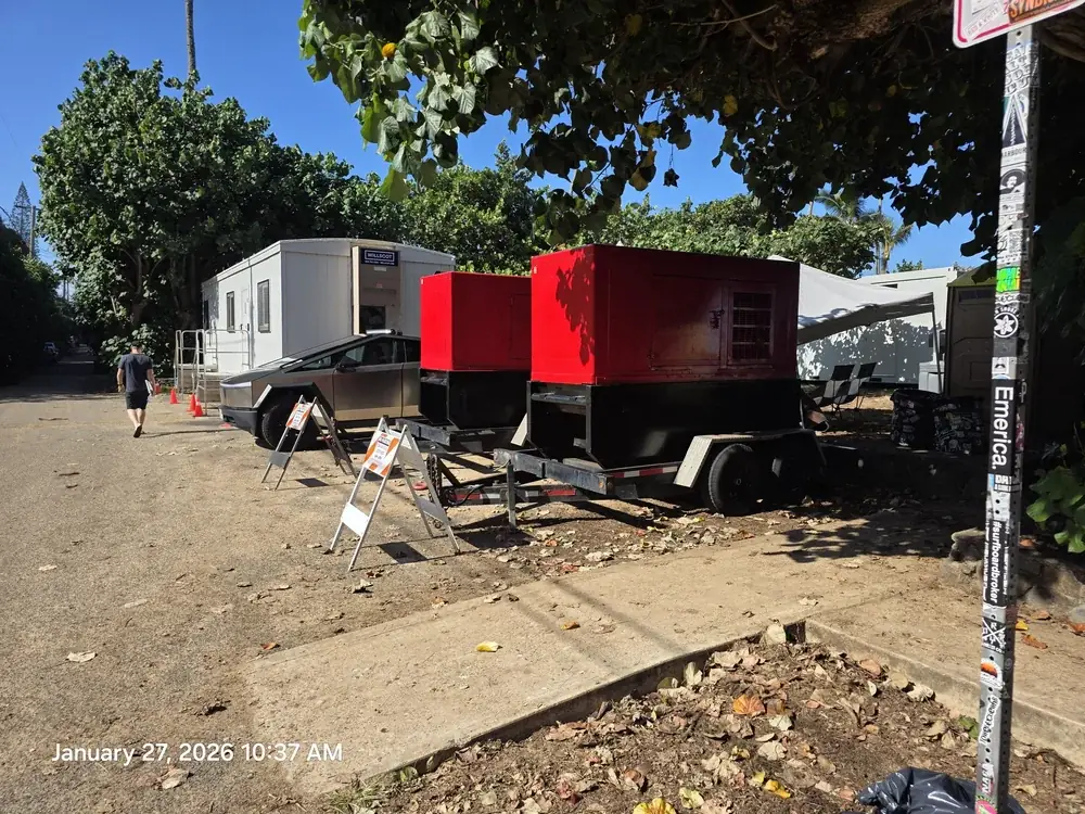 Rental generators parked on a job site